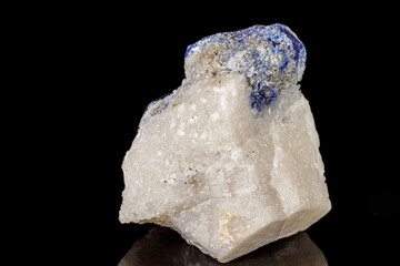 Macro of mineral stone Lazurite on a black background