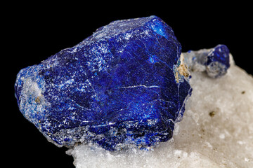Macro of mineral stone Lazurite on a black background