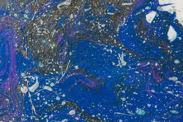 Abstract space blue purple silver black background. Acrylic painting fluid art. Night waves of the ocean. Conceptual art drawing. Fashionable background for design. Modern art, original drawing