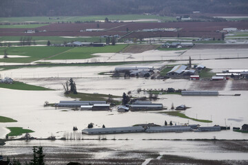 Devastating Flood Natural Disaster in the city and farmland after storm. Abbotsford, Greater...