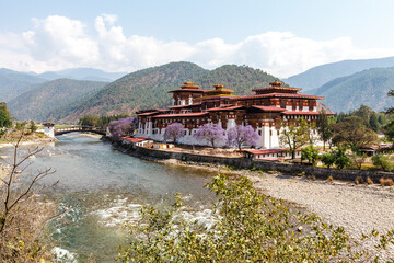 Fototapeta na wymiar View at Punakha Dzong monastery and the landscape with the Mo Chhu river, Bhutan, Asia