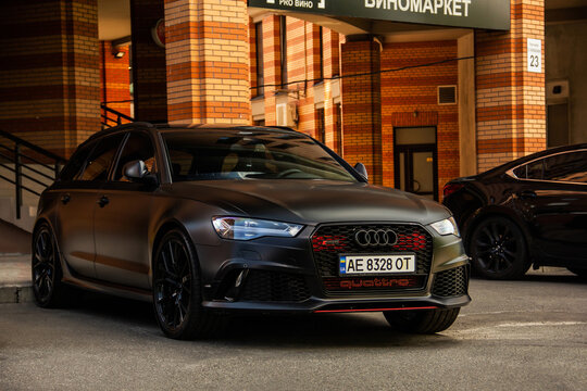 Kiev, Ukraine - June 12, 2021: Matte black Audi RS6 car parked in the city