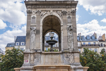 Fountain of the Innocents (Fontaine des Innocents, 1547 - 1550) at place Joachim-du-Bellay in Paris. Fountain of the Innocents is oldest monumental fountain in Paris, France.