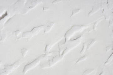 White cream texture smears top view, sunscreen moisturiser skincare background