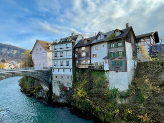 Colorful houses in medieval town Feldkirch, Vorarlberg, Austria at the riverbank of Ill.