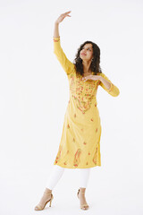 Woman in indian clothes showing dance move