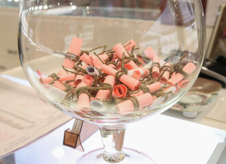 notes with predictions in a large glass glass