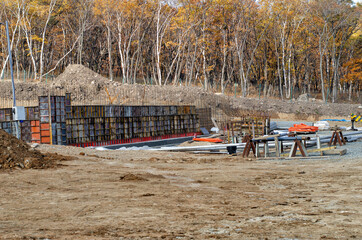 Construction site in a wooded area.