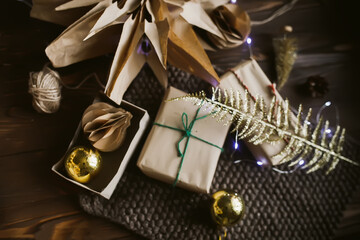 Gift box with handmade Christmas tree toys made of recycled paper. Zero waste Christmas