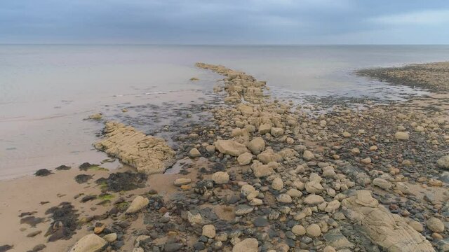 Aerial view over beach and rocks at the south coast of the Isle of Arran, Scotland