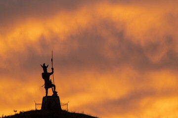 The Black Viking statue under brilliant sunrise skies in Fort Ransom, North Dakota, USA