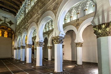 White arches at Ancient Sinagoga de Santa Maria La Blanca, Synagogue in Toledo, Spain