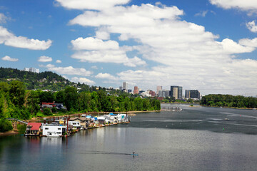USA, Oregon, Portland. Paddleboarding on the Willamette River.