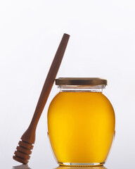 honey with a wooden spoon