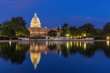 US Capitol Building at blue hour with reflection in the pool in Washington DC