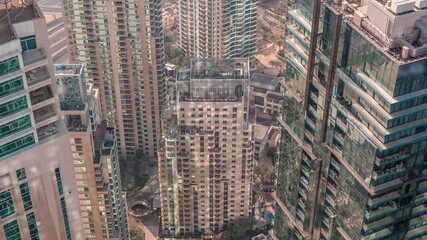 Fototapeta na wymiar Dubai skyscrapers from above look down perspective timelapse. Dubai Marina aerial view