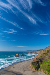 USA, Oregon. Rocky coast with pounding surf along the Pacific Coast Highway.