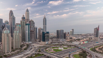 Naklejka na ściany i meble Dubai Marina highway intersection spaghetti junction day to night timelapse