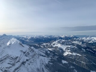 snow covered mountains in winter as seen from the glacier 3000 (glacier3000) in the swiss alps