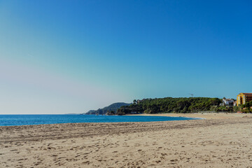 beautiful empty beach landscape with clear blue sky and copy space