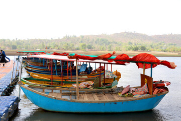 Fototapeta na wymiar Wooden Boat (ferry) tourist attraction at lake of dudhni at Gujarat- India
