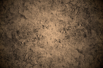 Dry cracked concrete floor surface with heavy grunge texture for background