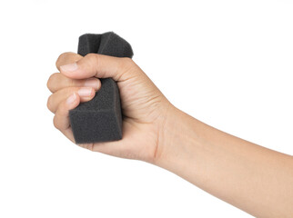 Hand holding Black sponge foam shockproof isolated on white background