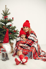 Mother with little daughter at home