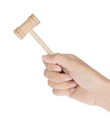 Hand holding Wooden Hammer Toy Isolated on white Background.