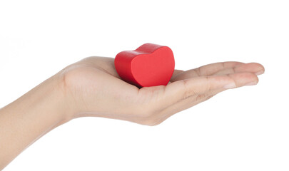 Hand holding toy heart shape wooden  isolated on white background