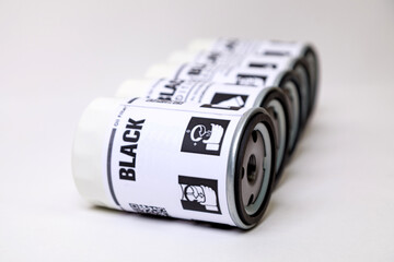 Iron oil filters for the compressor on a white background.