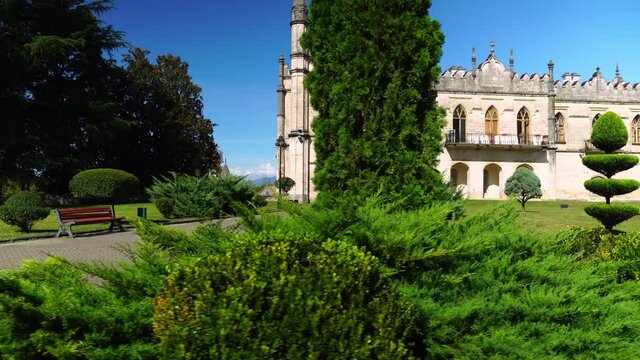 Beautiful trimmed miniature green trees in garden in the park. place is located in Georgia on the territory of the Dadiani Castle tourist resort. Zugdidi. park with beautiful landscapes and figures.