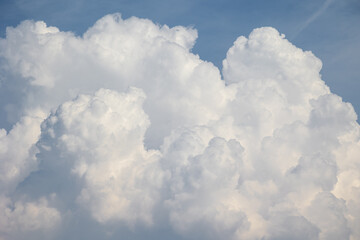 white thunderclouds against a blue sky. weather station and weather forecast. cloud cover hurricane and rain