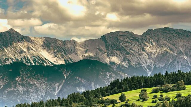 Timelapse of a storm approaching the peaks and mountain ranges of the Alps on the border between Italy and Austria. Brenner Pass, Italy, Europe
