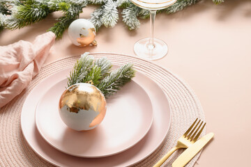 Christmas monochrome table setting with pink and gold modern decoration, silverware