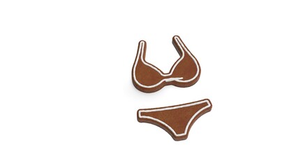 3d rendering of gingerbread symbol of bikini isolated on white background