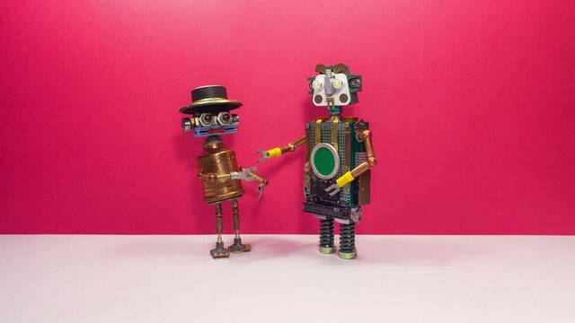 Meeting of friends. Two robots greet each other and drink beer, rejoicing at the meeting. Stop motion animation