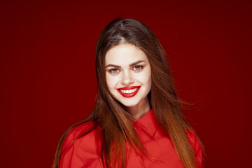 Fototapeta premium beautiful woman hairstyle makeup red shirt model