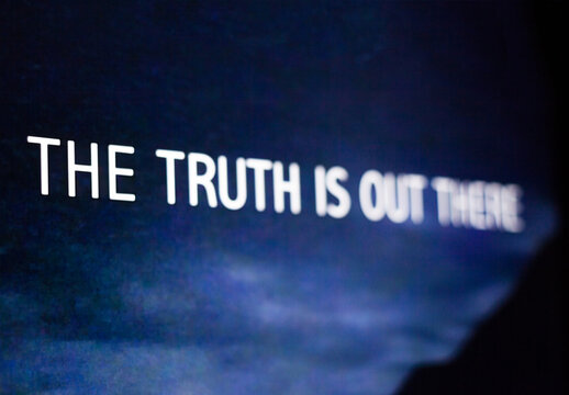 "The truth is out there" on the screen.