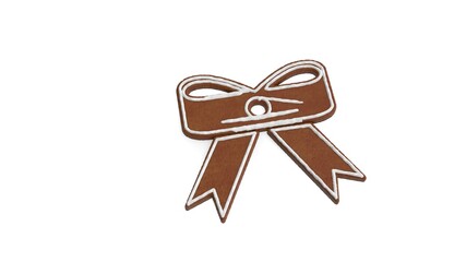 3d rendering of gingerbread symbol of Christmas bow isolated on white background