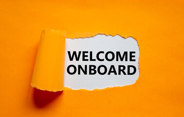 Welcome onboard onboarding symbol. Concept words Welcome onboard appearing behind torn orange paper. Beautiful orange background. Business, welcome onboard onboarding concept, copy space.