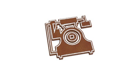 3d rendering of gingerbread symbol of vintage telephone isolated on white background