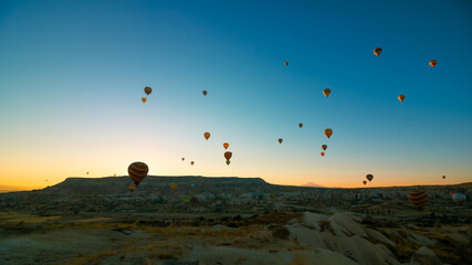 Cappadocia balloons. Hot air balloons in Goreme at sunrise.