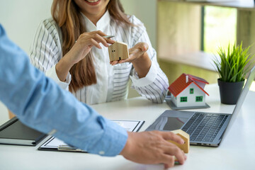 Real estate broker agent presenting and consult to the customer to decision making sign insurance...