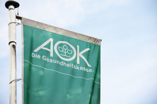 Hannover, Lower Saxony, Germany - October 10, 2021: AOK flag in Hanover, Germany - AOK - Allgemeine Ortskrankenkasse - is one of the leading health insurance companies in Germany
