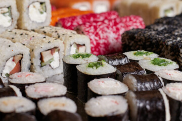 sushi set on the table, macro, close-up, various sushi and rolls, food, asian cuisine