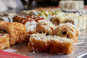 sushi set on the table, macro, close-up, various sushi and rolls, food, asian cuisine