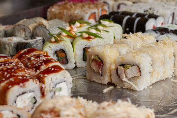 sushi set on the table, macro, close-up, various sushi and rolls, food, asian cuisine
