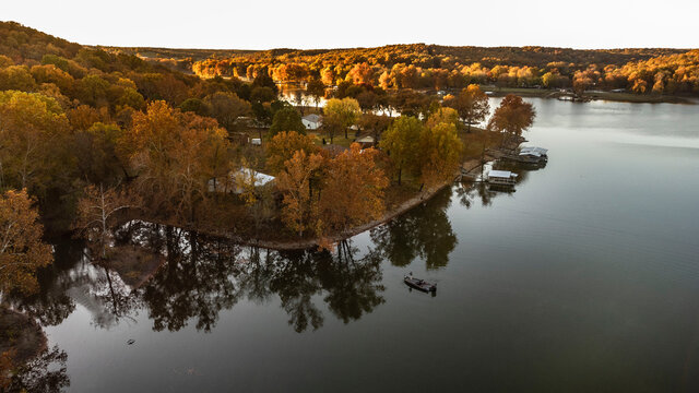 Fisherman Fishing During Fall Sunrise On Grand Lake In Oklahoma