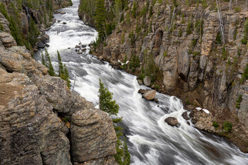 USA, Wyoming, Yellowstone National Park. Snowmelt rushes down the Lewis River Canyon.